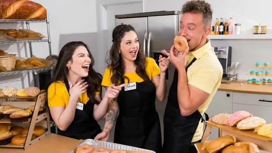 Two pretty girls work in a bakery and are never alien to the delights of an office romance